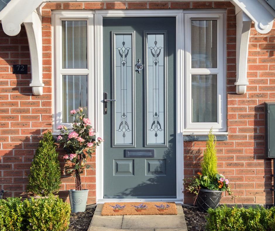 House with grey front door, white frame and decorative glass - Wymondham Windows